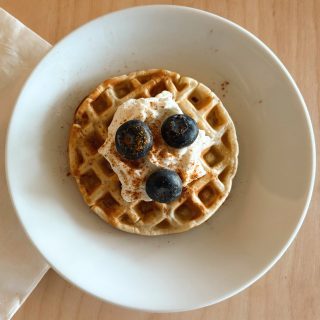 mini sourdough waffle with blueberries and whipped cream