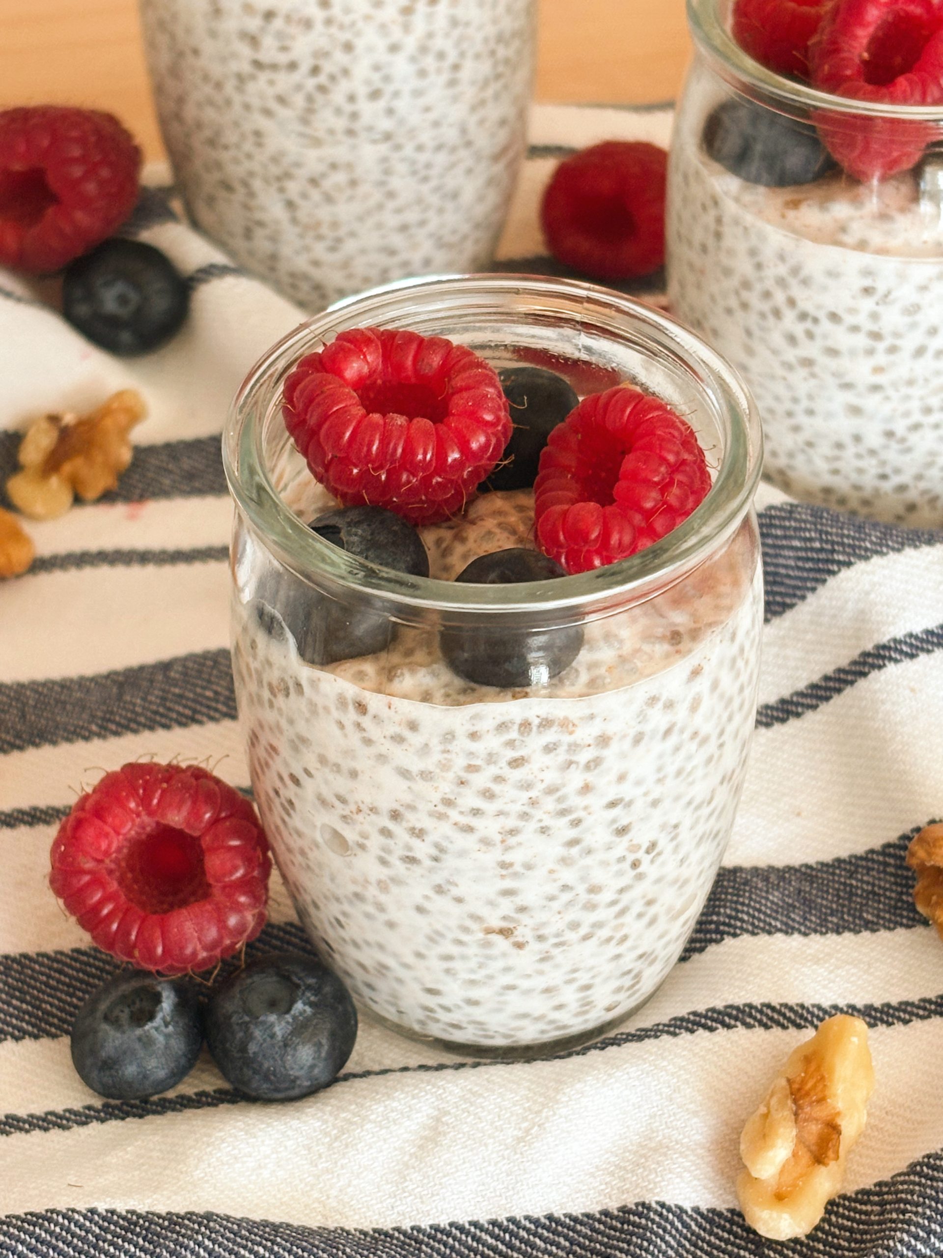 chia seed pudding with coconut milk and blueberries and raspberries